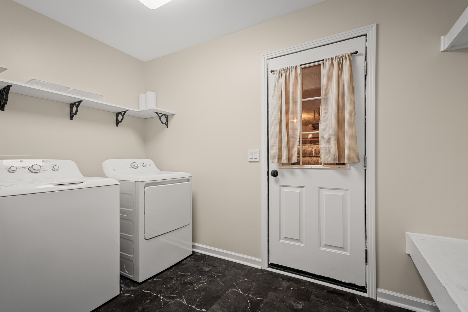 2427 Toler Road Woodlawn, TN 37191 - Photo 22 of 48 a utility room with dryer and washer