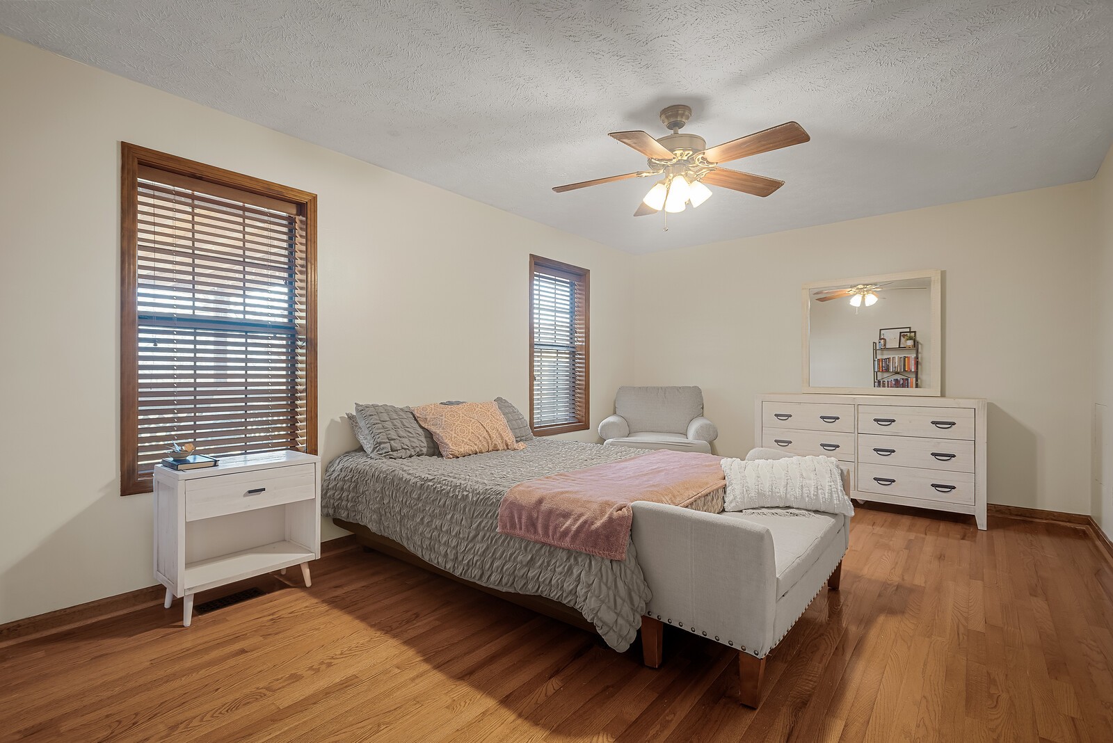 2427 Toler Road Woodlawn, TN 37191 - Photo 24 of 48 a bedroom with a bed and wooden floor