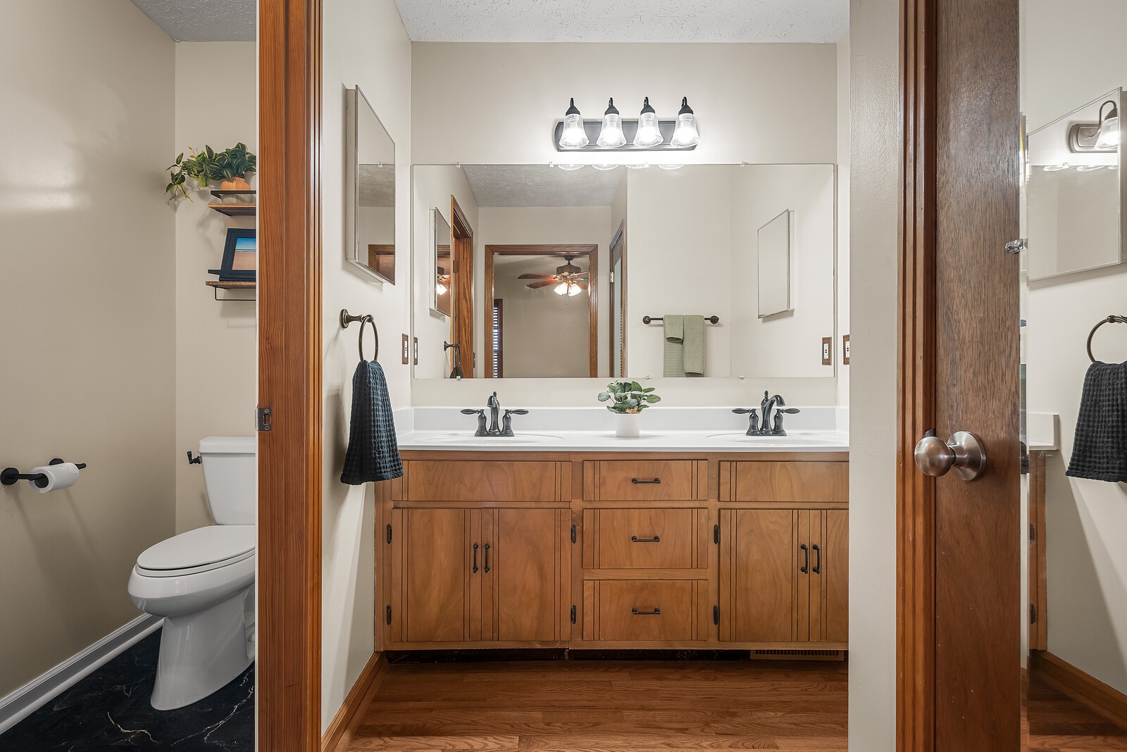 2427 Toler Road Woodlawn, TN 37191 - Photo 26 of 48 a bathroom with a sink a toilet and a mirror