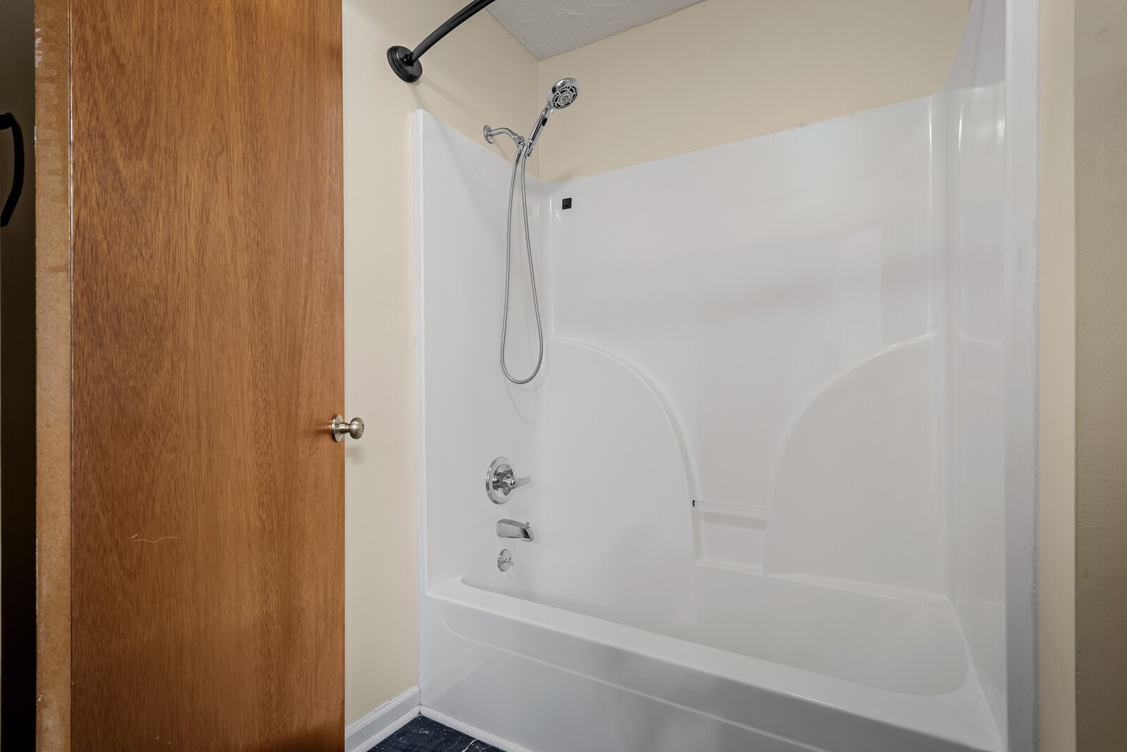 2427 Toler Road Woodlawn, TN 37191 - Photo 28 of 48 a bathroom with a bathtub and a shower
