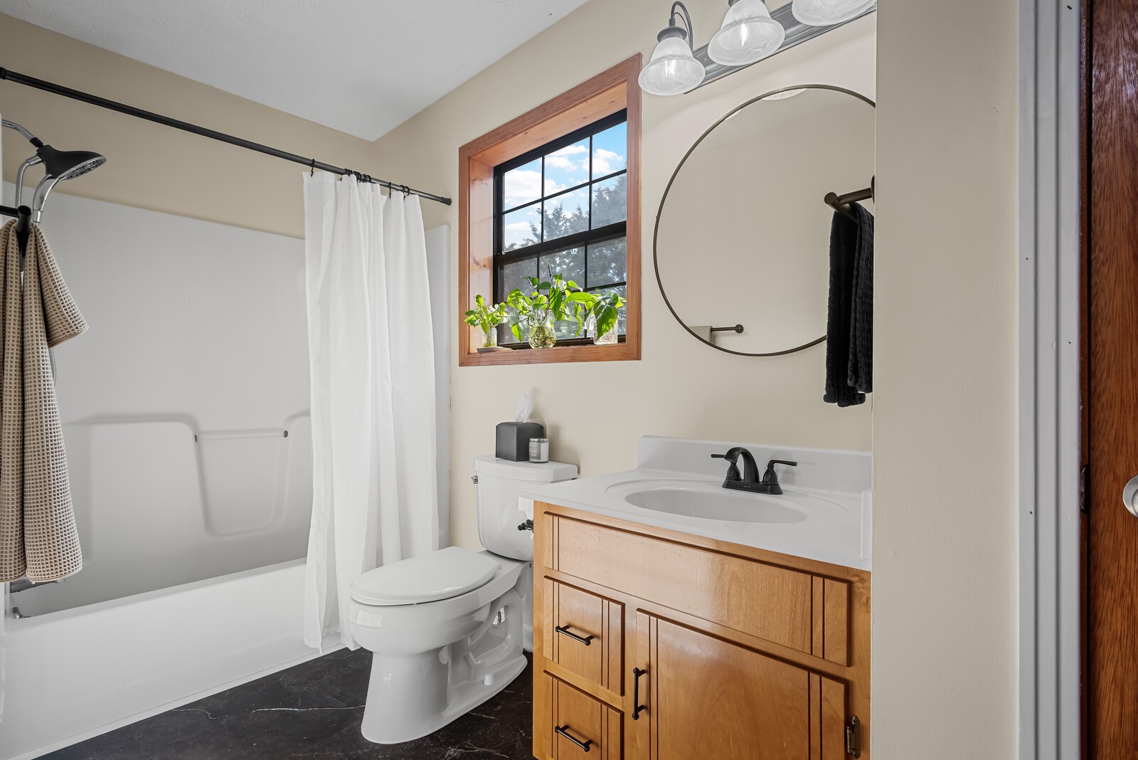 2427 Toler Road Woodlawn, TN 37191 - Photo 31 of 48 a bathroom with a toilet sink and mirror