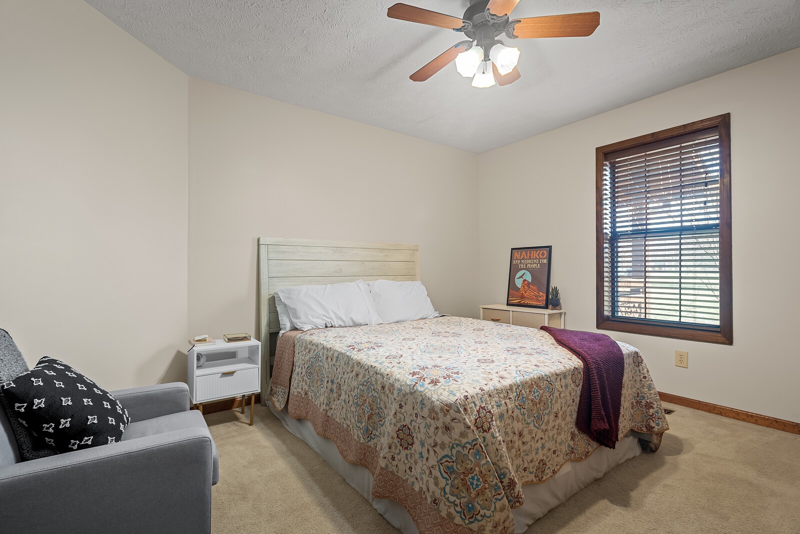 2427 Toler Road Woodlawn, TN 37191 - Photo 32 of 48 a spacious bedroom with a bed and a window