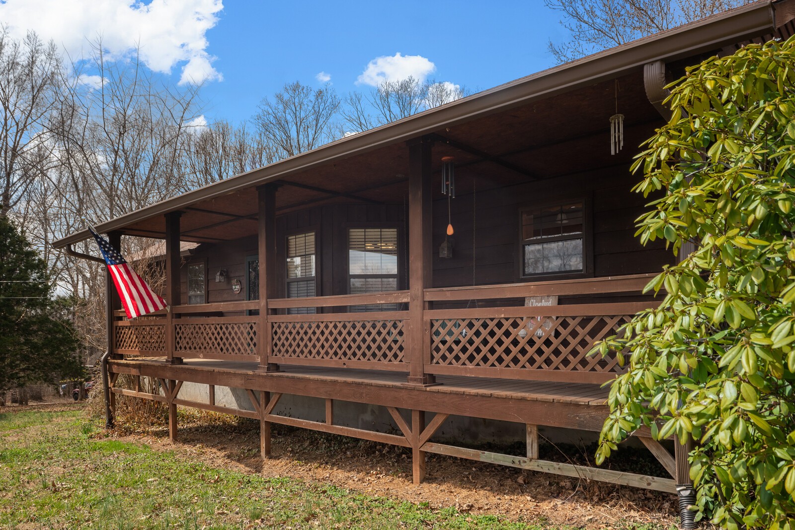 2427 Toler Road Woodlawn, TN 37191 - Photo 4 of 48 a balcony with table and chairs