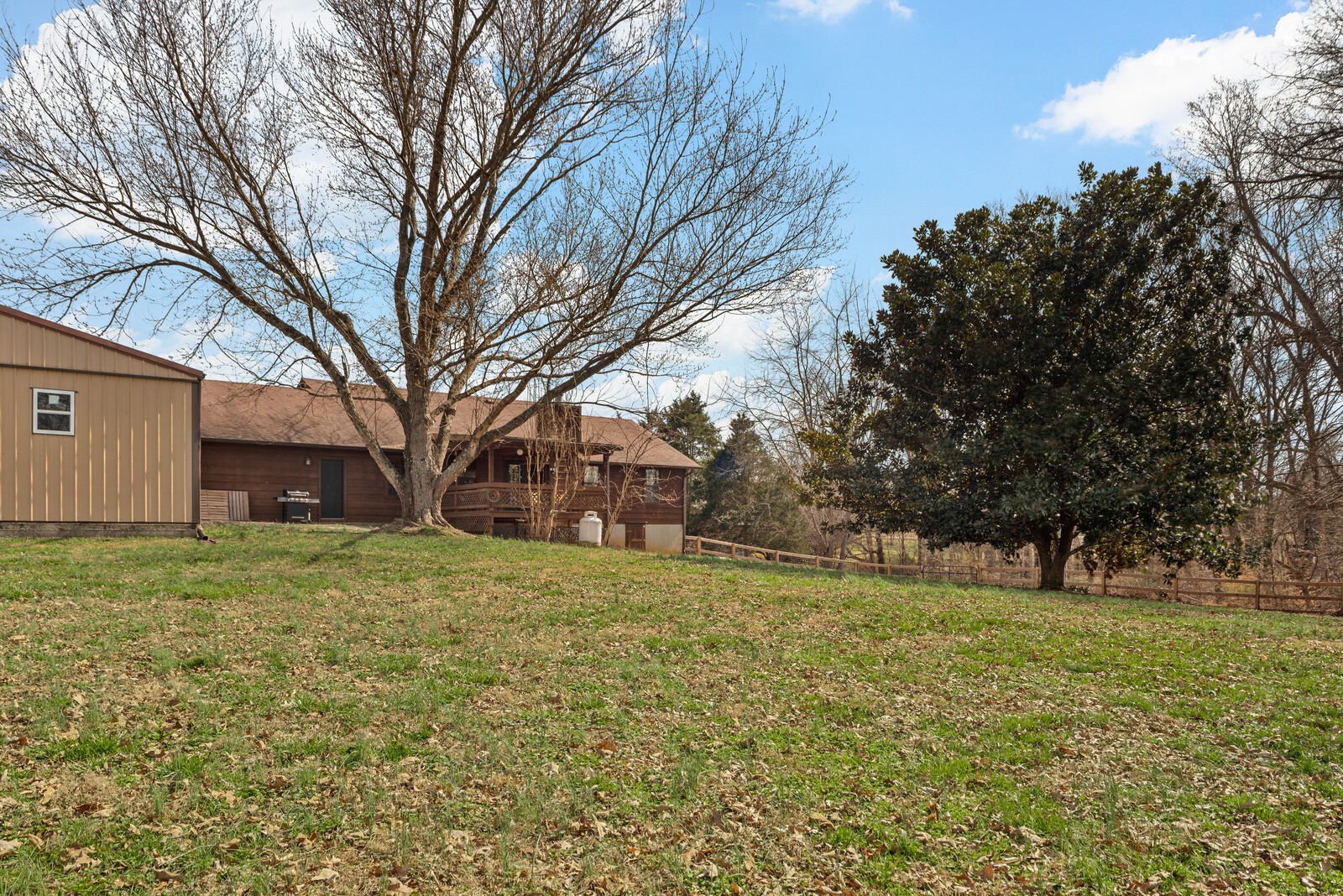 2427 Toler Road Woodlawn, TN 37191 - Photo 44 of 48 a house view with yard