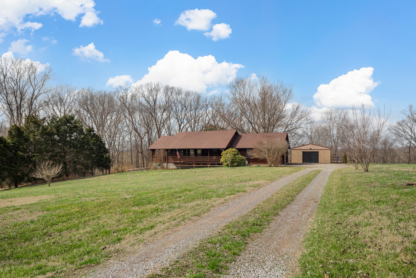 2427 Toler Road Woodlawn, TN 37191 - Photo 47 of 48 a view of a house with a yard