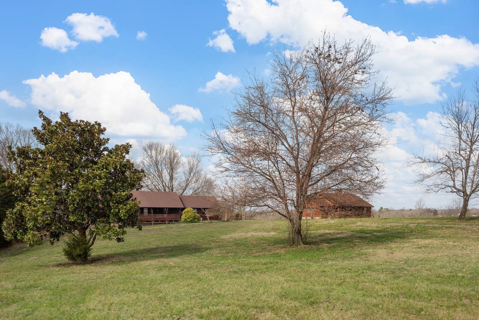 2427 Toler Road Woodlawn, TN 37191 - Photo 48 of 48 a view of a house with a yard