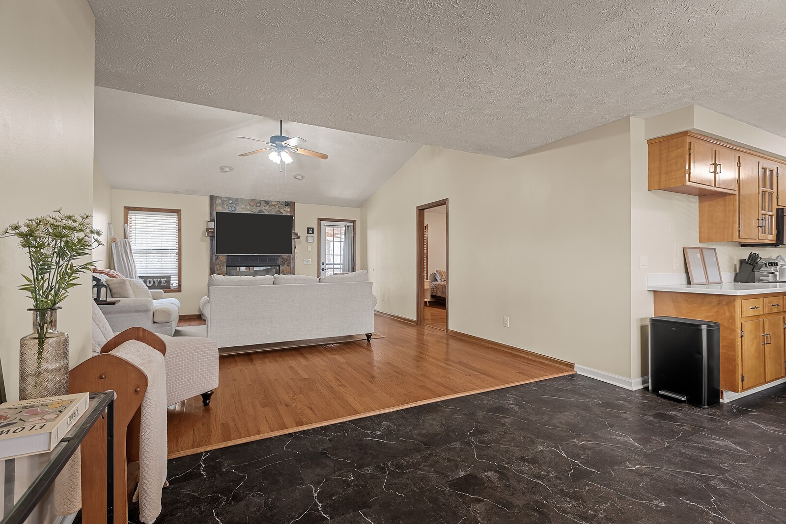 2427 Toler Road Woodlawn, TN 37191 - Photo 7 of 48 a living room with furniture and a fireplace
