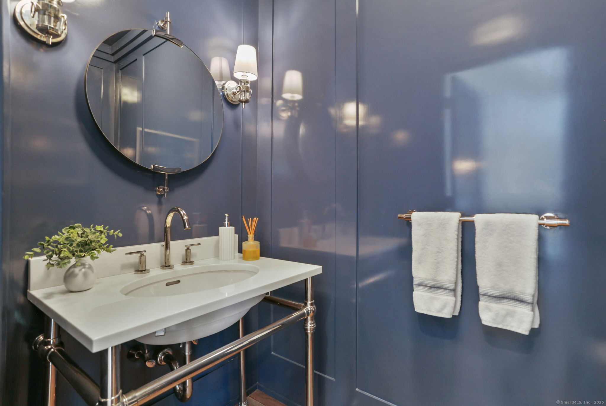 28 Norwalk Avenue Westport, CT 06880 - Photo 16 of 36 a bathroom with a sink a mirror and vanity