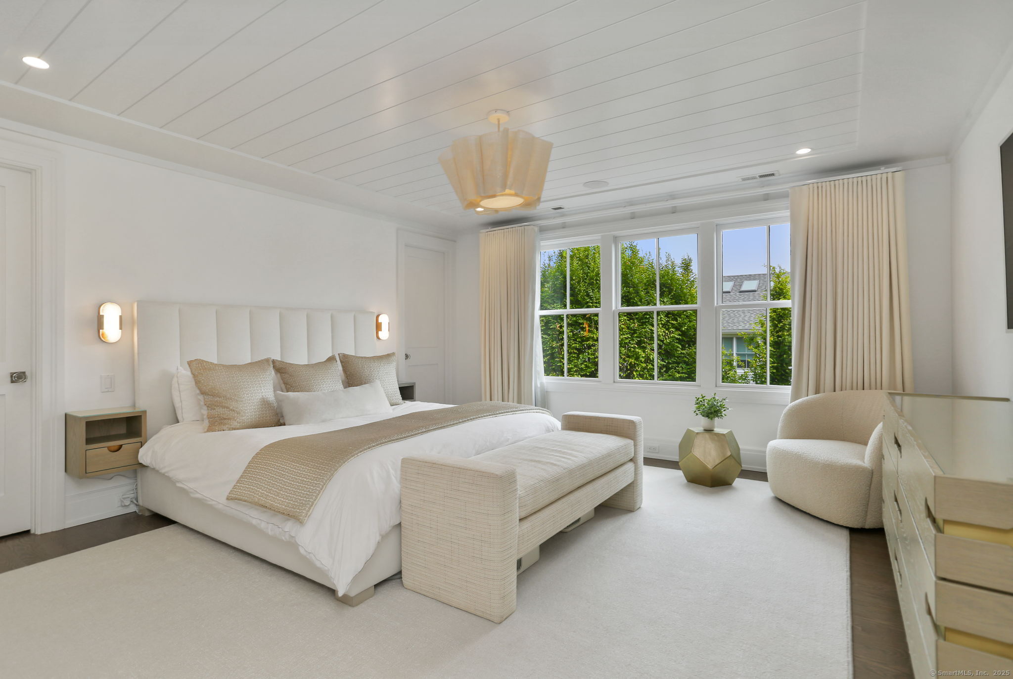 28 Norwalk Avenue Westport, CT 06880 - Photo 17 of 36 a bedroom with a bed and a couch