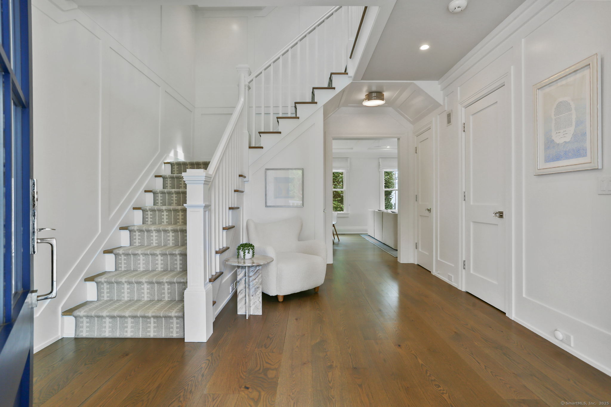 28 Norwalk Avenue Westport, CT 06880 - Photo 3 of 36 a view of an entryway with wooden floor