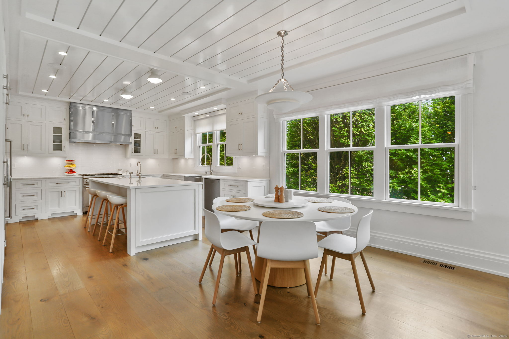 28 Norwalk Avenue Westport, CT 06880 - Photo 8 of 36 a view of a dining room with furniture window and outside view