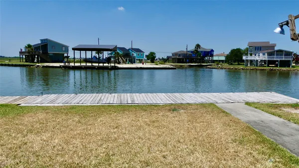 a view of a large body of water with water in front of it