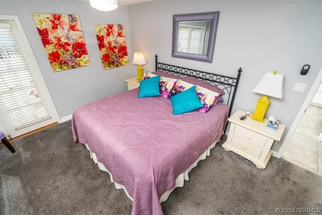 a bedroom with furniture and a bed