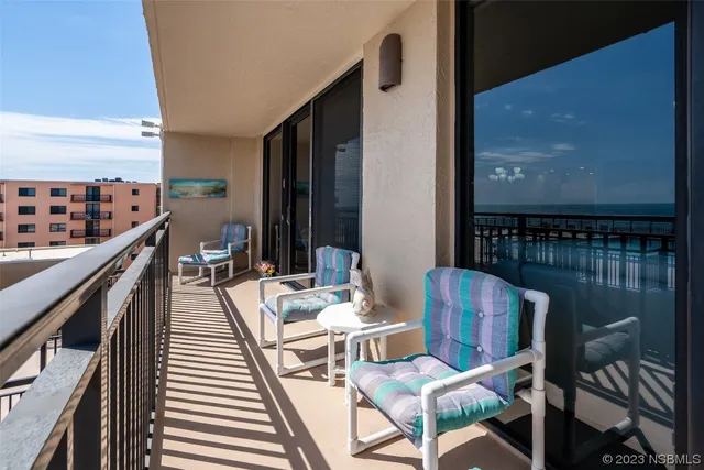a view of a living room with furniture