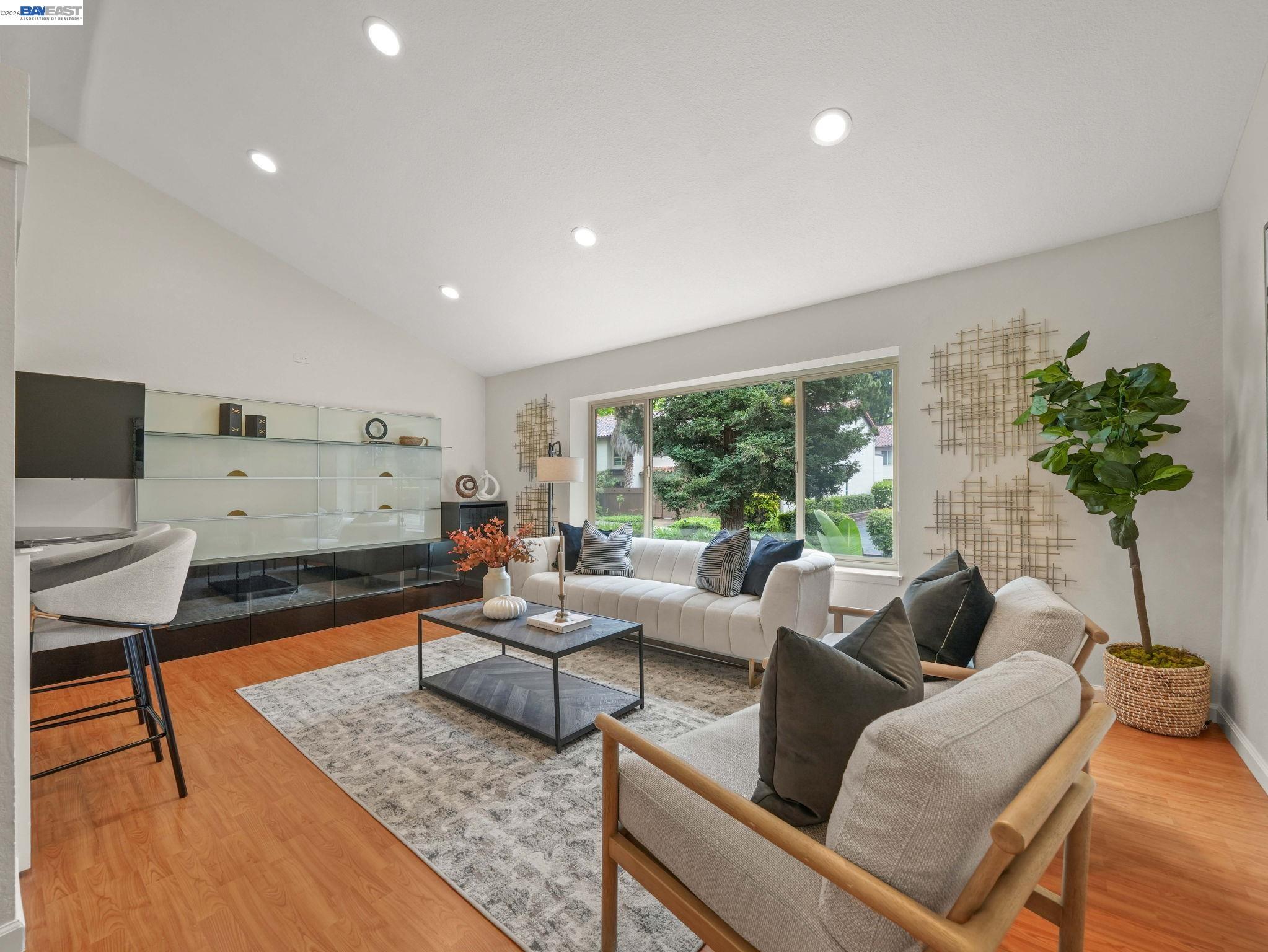 a living room with furniture and a couch