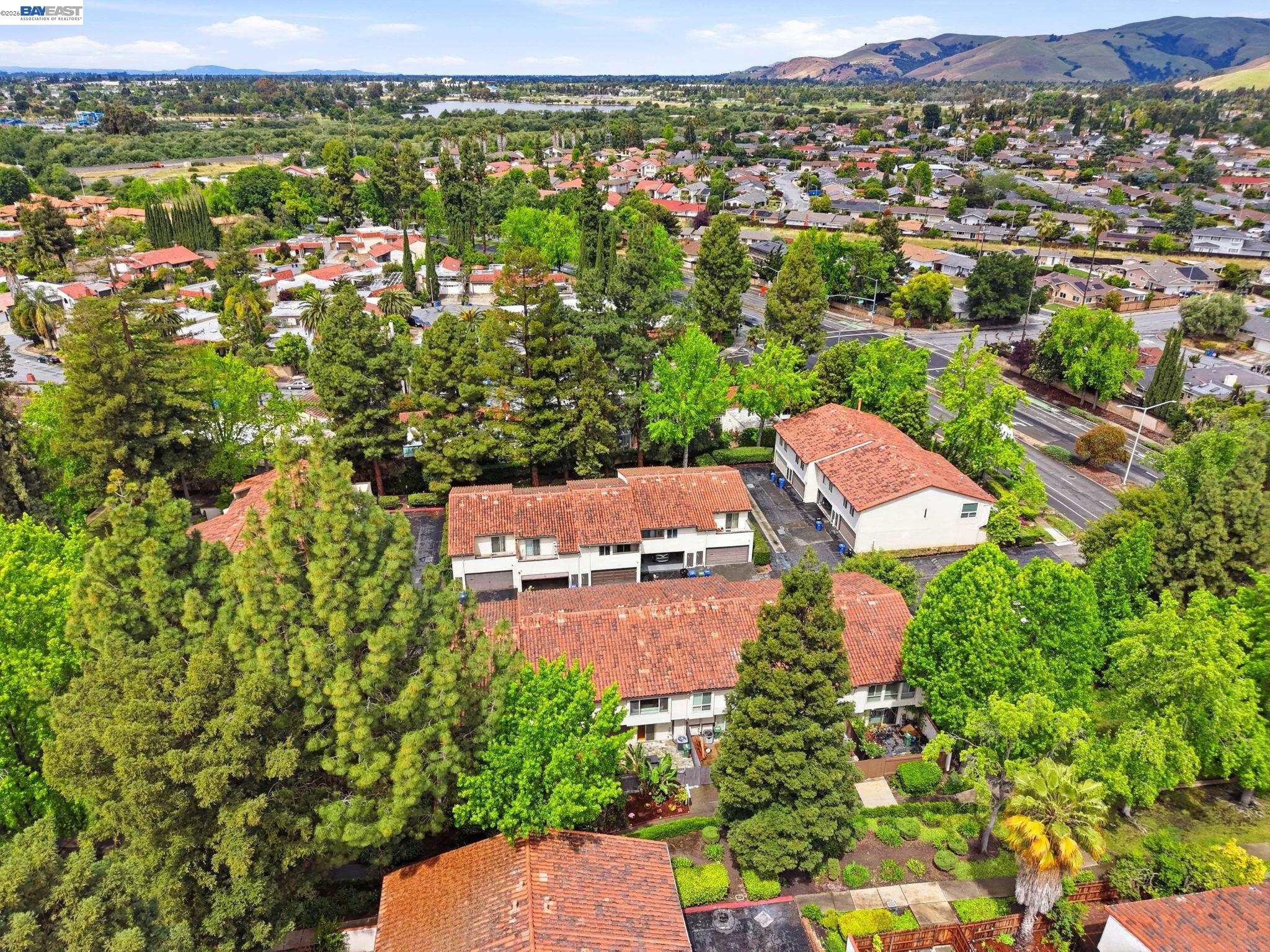 1972 Briscoe Terrace Fremont, CA 94539 - Photo 25 of 27 an aerial view of residential houses with outdoor space and trees