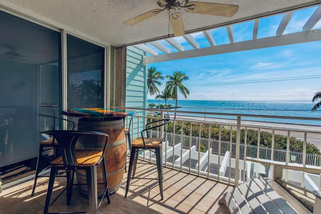 a view of a balcony dining area