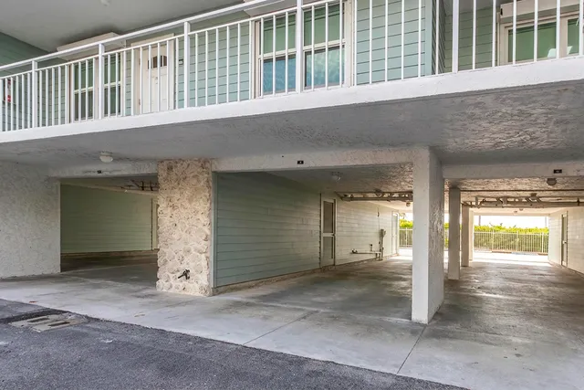 a view of a street with a tree