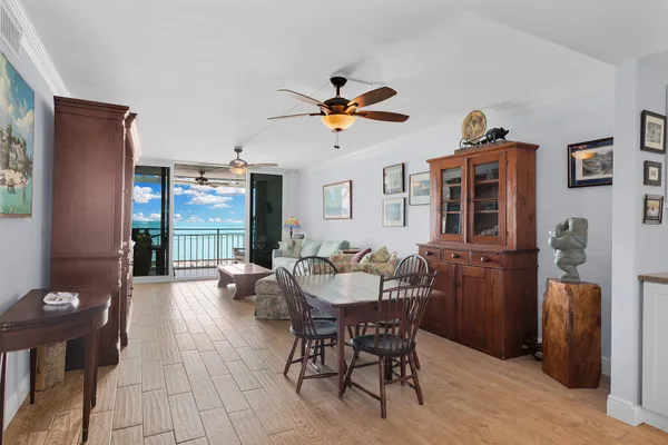 a dining room with furniture and window