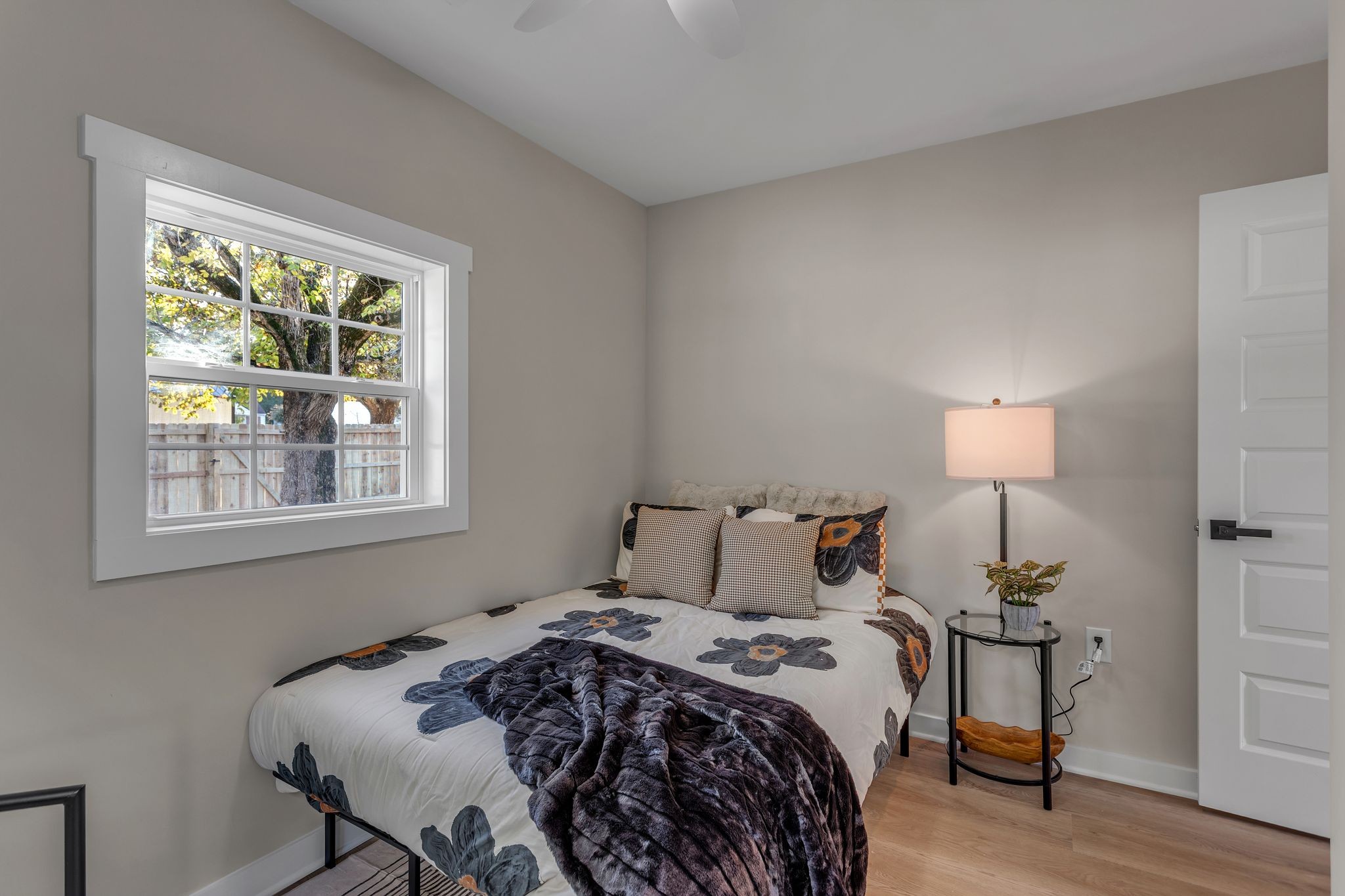 755 Center Street Lewisburg, TN 37091 - Photo 13 of 24 a bedroom with a bed and a lamp