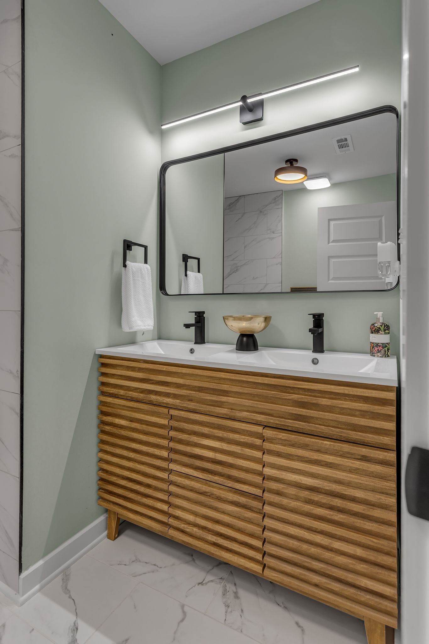 755 Center Street Lewisburg, TN 37091 - Photo 15 of 24 a bathroom with a sink and a mirror