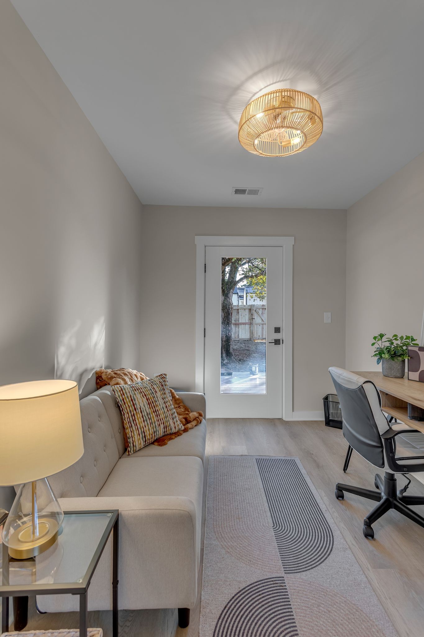 755 Center Street Lewisburg, TN 37091 - Photo 16 of 24 a living room with furniture and a chandelier