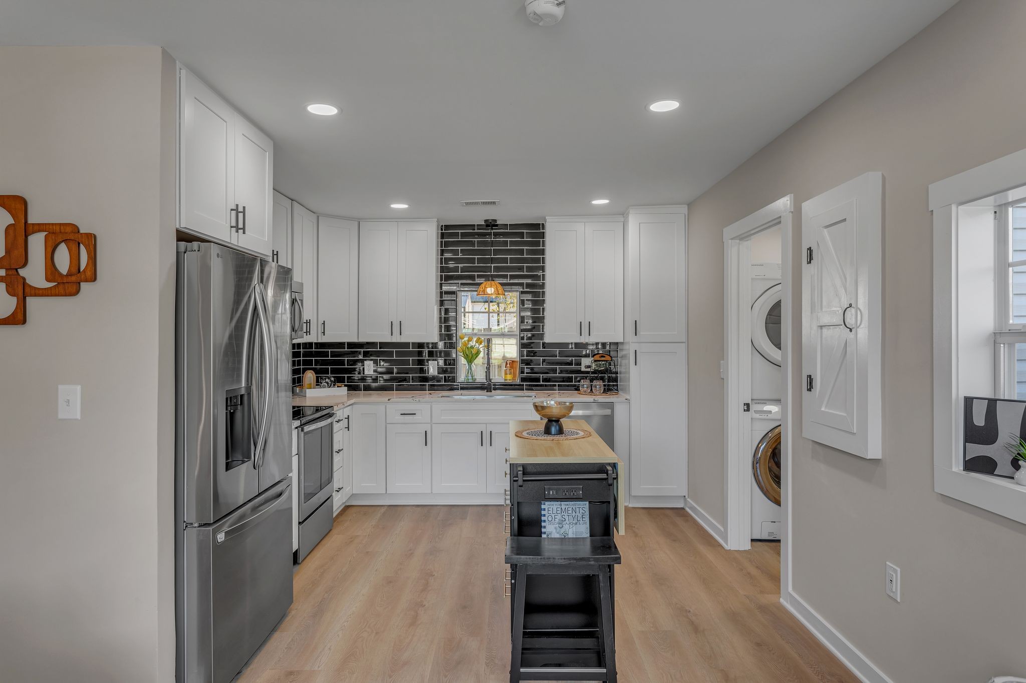 755 Center Street Lewisburg, TN 37091 - Photo 7 of 24 a kitchen with stainless steel appliances granite countertop a refrigerator and a stove top oven