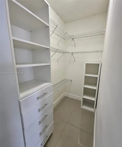 a view of an empty walk in closet