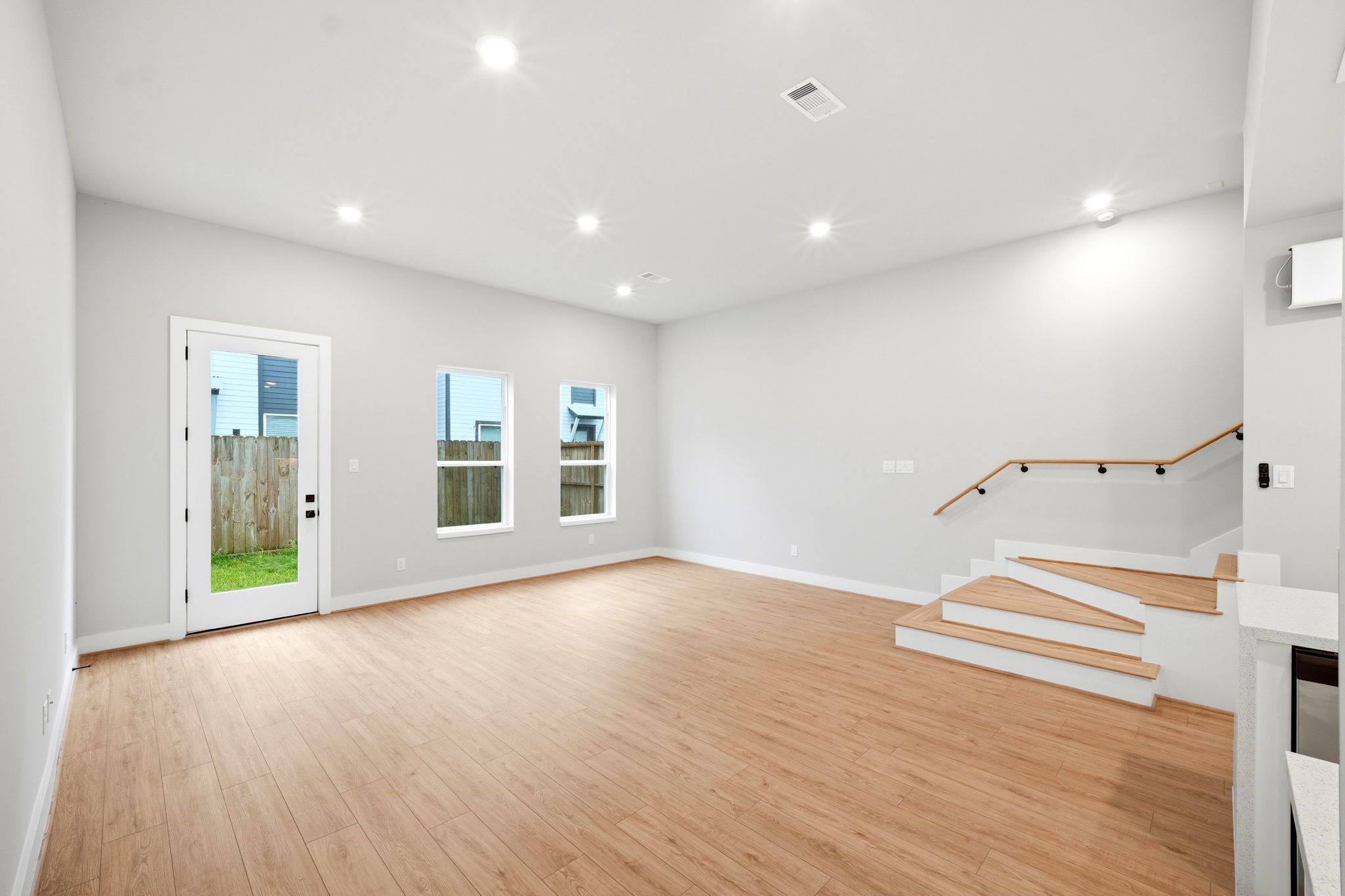 5814 Cebra Street Houston, TX 77091 - Photo 5 of 32 High ceilings and large windows flood the space with natural light.