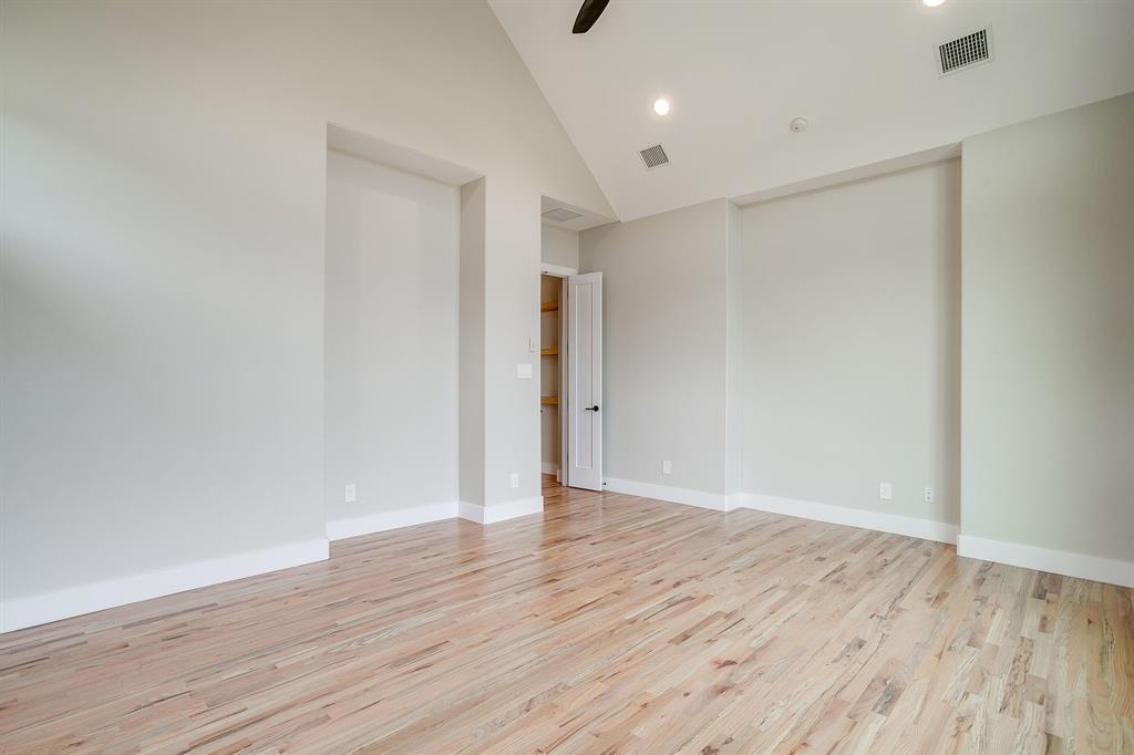 456 Acorn Trail Granbury, TX 76049 - Photo 27 of 40 a view of an empty room with wooden floor
