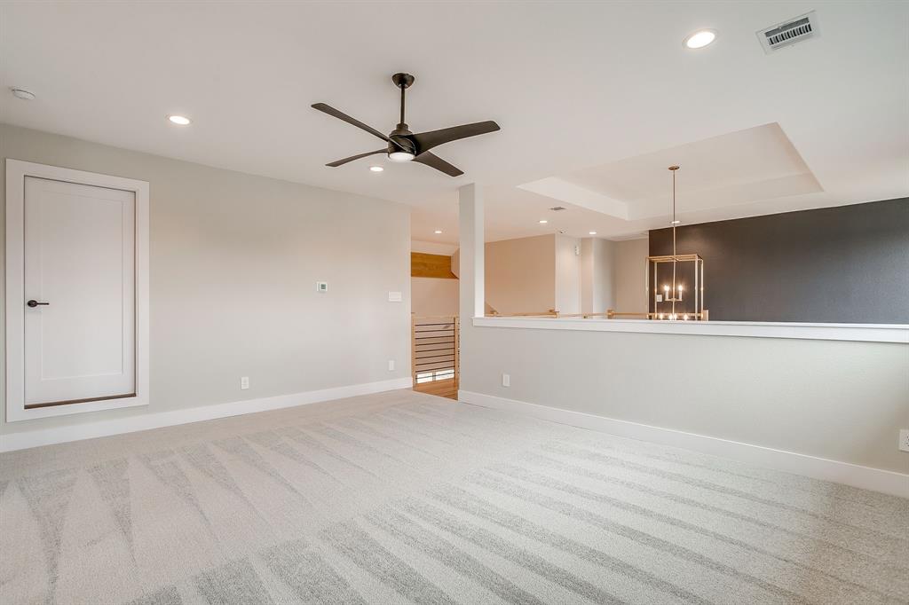 456 Acorn Trail Granbury, TX 76049 - Photo 33 of 40 a view of an empty room with window and a ceiling fan