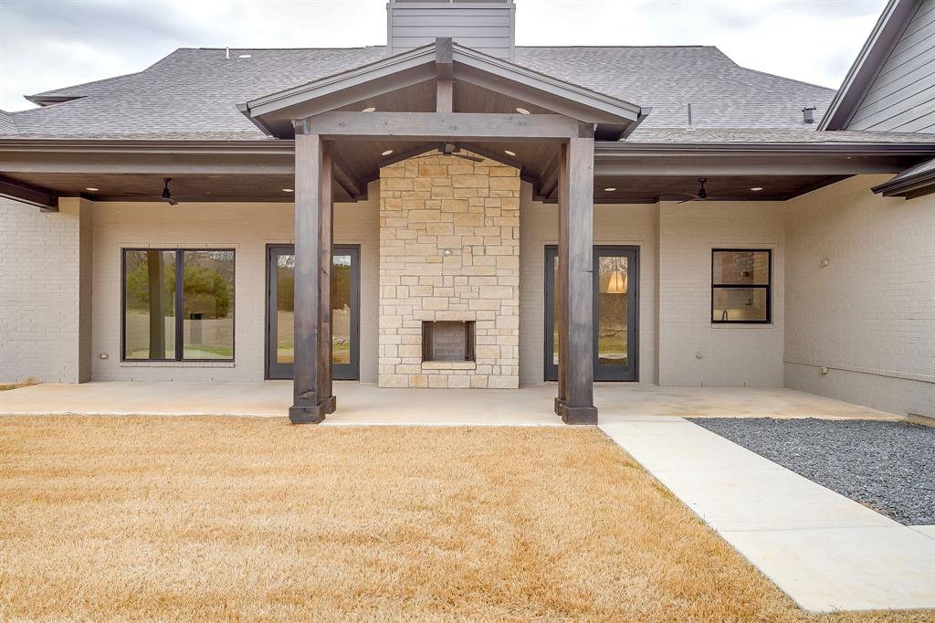 456 Acorn Trail Granbury, TX 76049 - Photo 38 of 40 a view of a house with a outdoor space