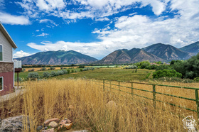 19 East Southfield Road Spanish Fork, UT 84660 - Photo 44 of 74 View of mountain background featuring rural landscape