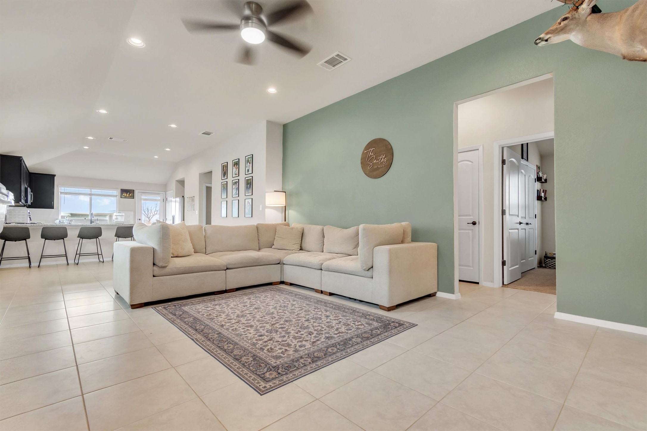 460 Delta Crest Maxwell, TX 78656 - Photo 4 of 18 Living room with ceiling fan, vaulted ceiling, recessed lighting, and light tile patterned floors