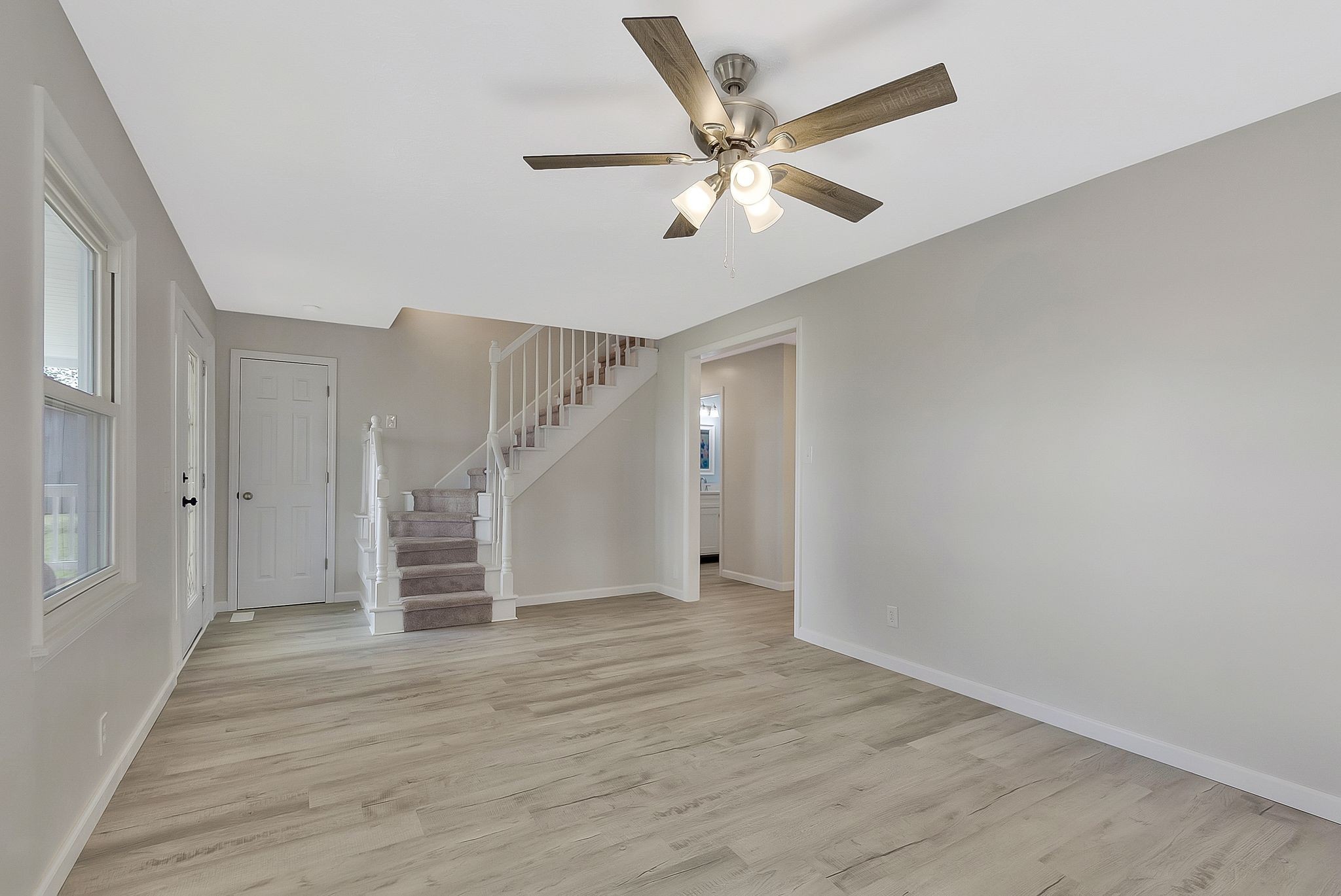 3289 Buffalo Road Ethridge, TN 38456 - Photo 16 of 45 wooden floor in an empty room with a window