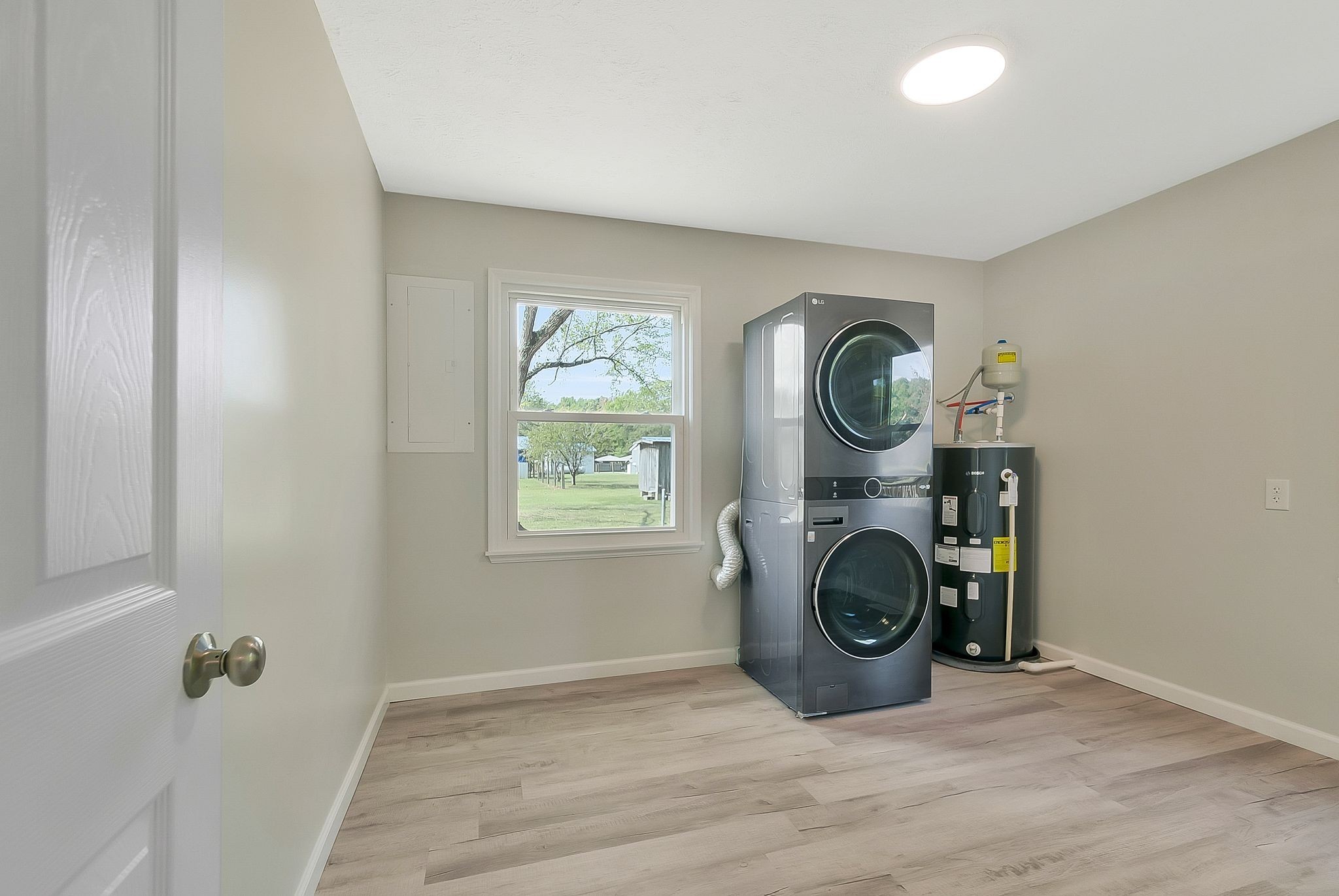 3289 Buffalo Road Ethridge, TN 38456 - Photo 21 of 45 a view of a livingroom with washer and dryer