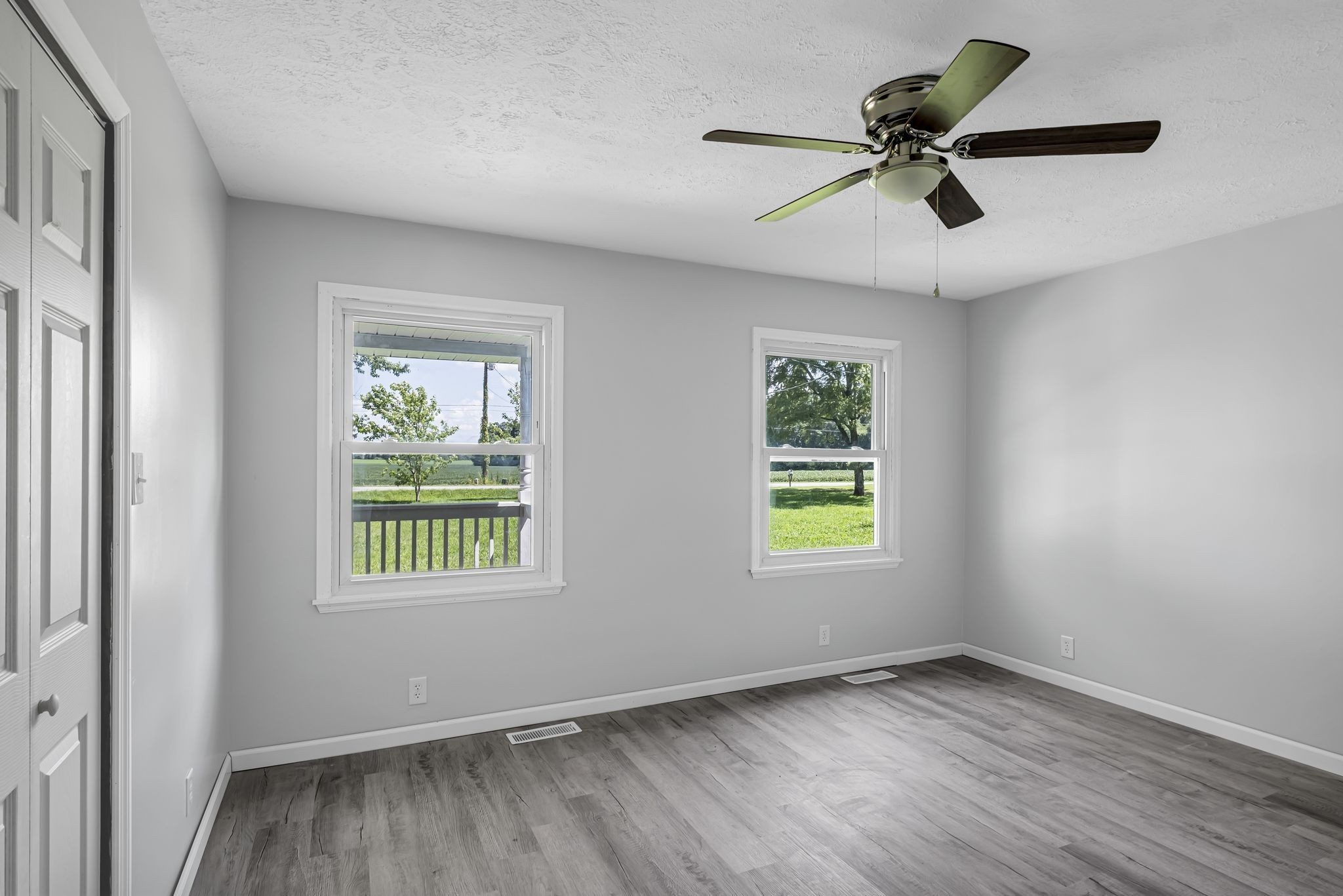 3289 Buffalo Road Ethridge, TN 38456 - Photo 24 of 45 wooden floor in an empty room with a window