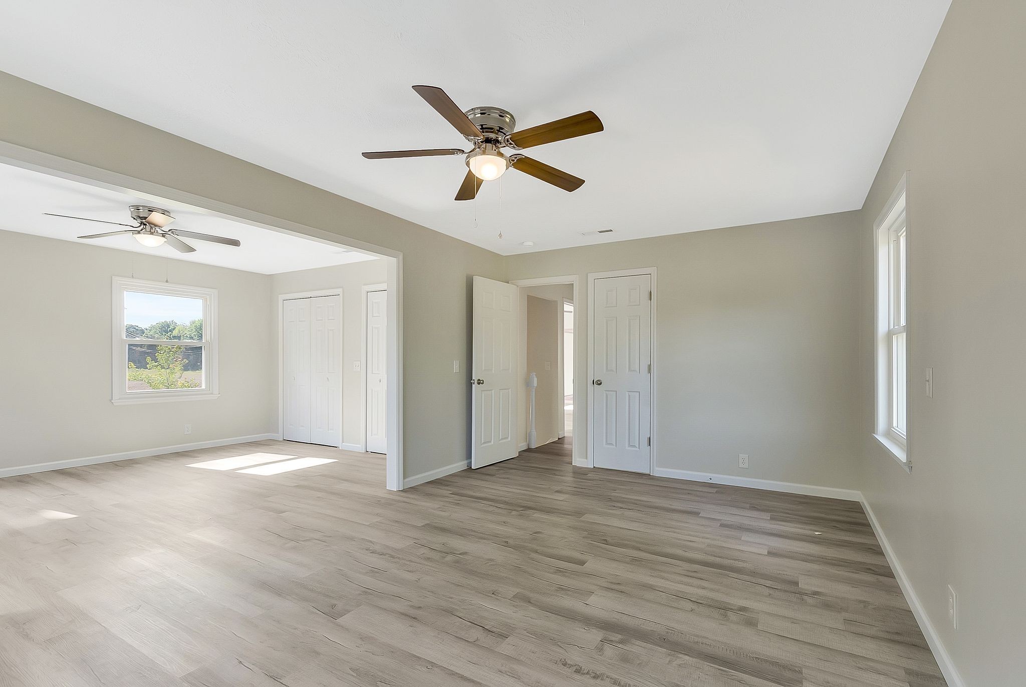3289 Buffalo Road Ethridge, TN 38456 - Photo 25 of 45 a view of empty room with wooden floor and fan