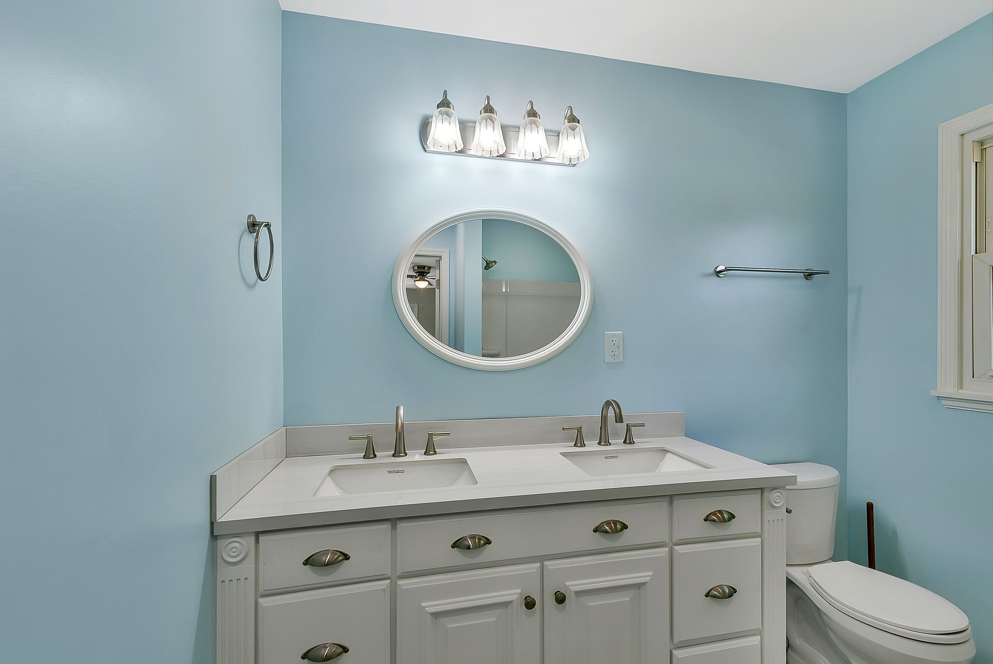 3289 Buffalo Road Ethridge, TN 38456 - Photo 29 of 45 a bathroom with a toilet a sink and mirror