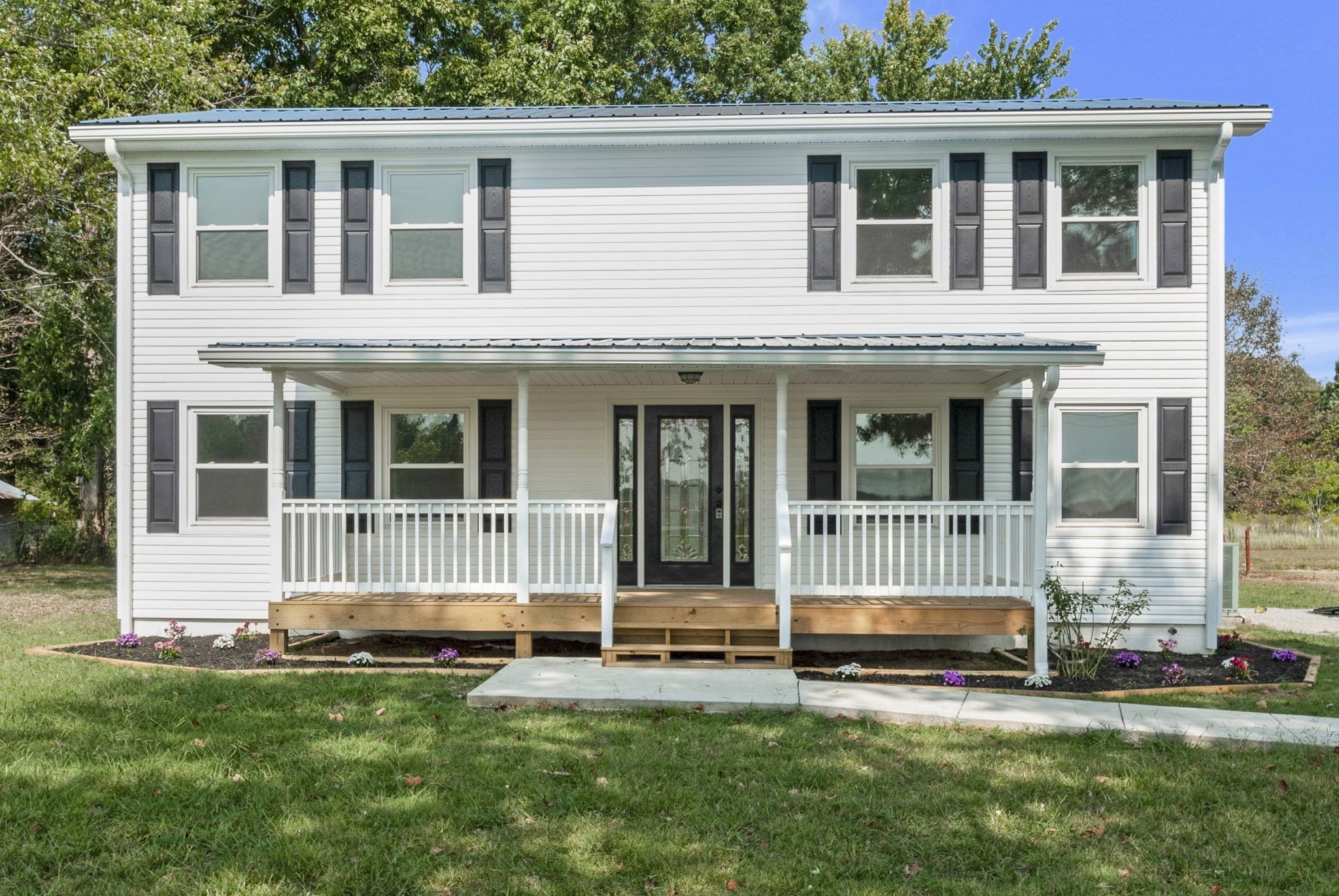 3289 Buffalo Road Ethridge, TN 38456 - Photo 3 of 45 a house view with a garden space
