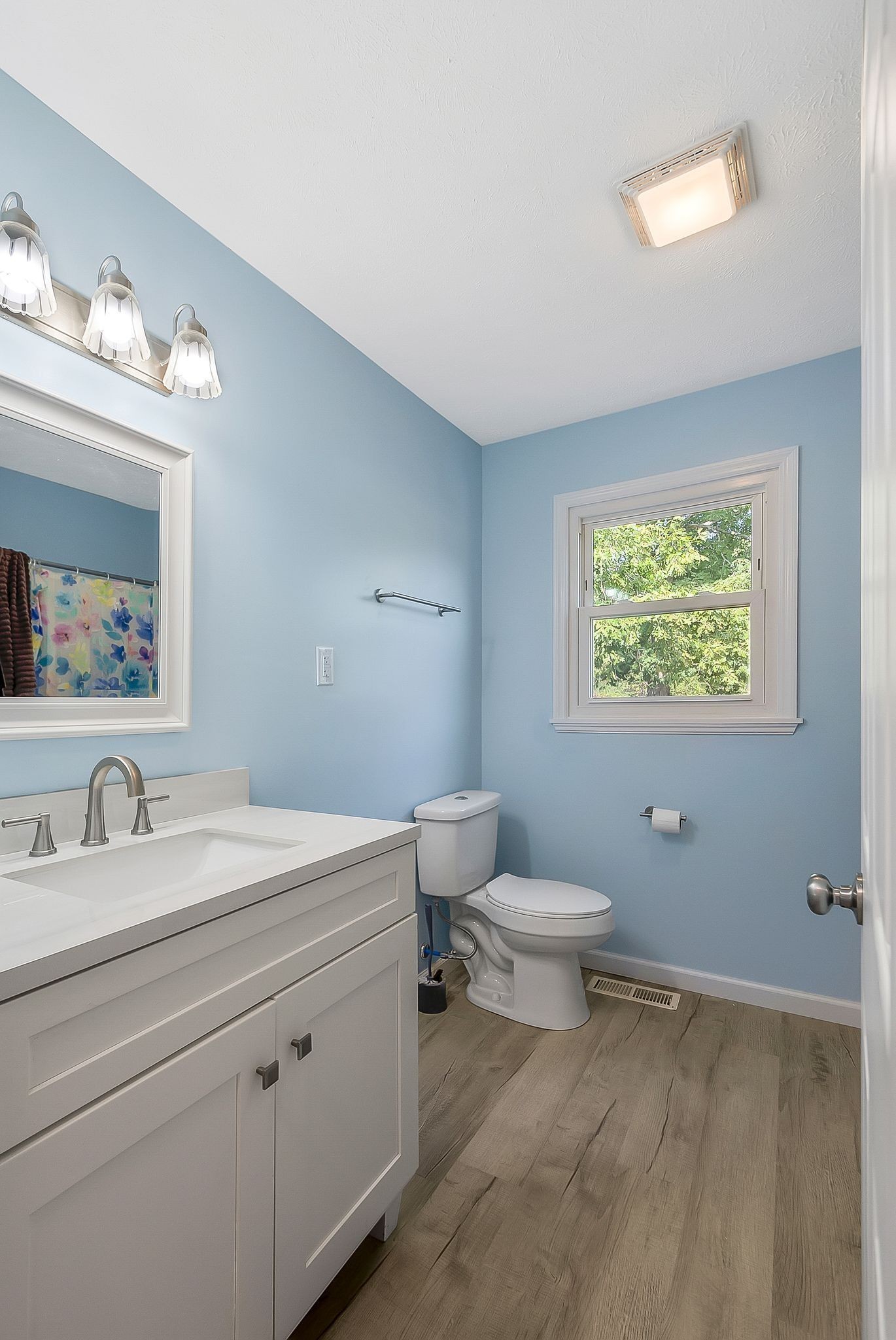 3289 Buffalo Road Ethridge, TN 38456 - Photo 31 of 45 a bathroom with a sink a toilet and a mirror
