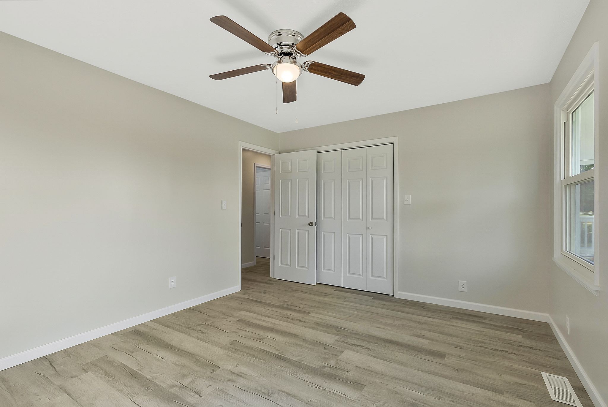 3289 Buffalo Road Ethridge, TN 38456 - Photo 38 of 45 wooden floor in an empty room with a window
