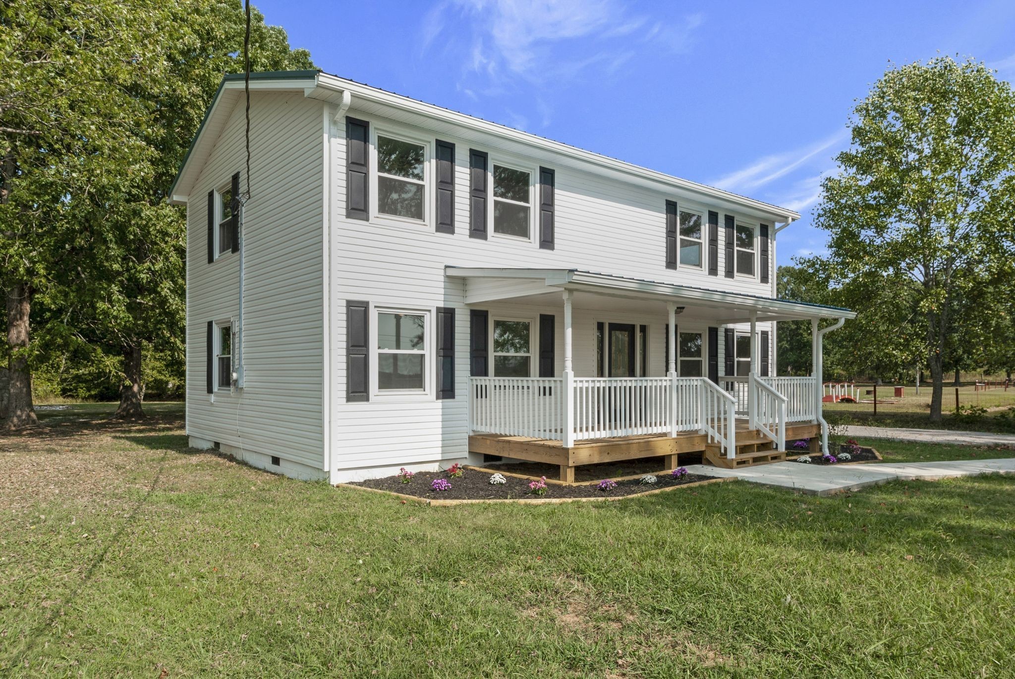 3289 Buffalo Road Ethridge, TN 38456 - Photo 6 of 45 a house view with a garden space