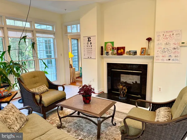 a room with furniture and a book shelf