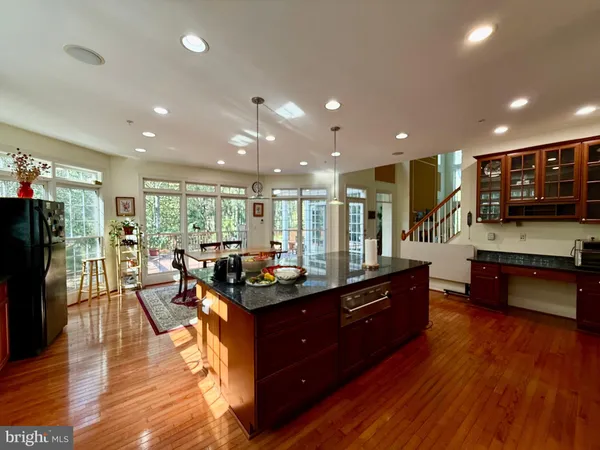 a kitchen with a stove and a microwave