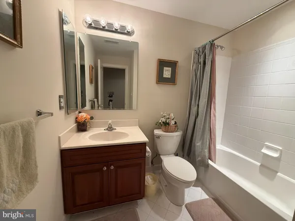 a view of a golf course with a tree