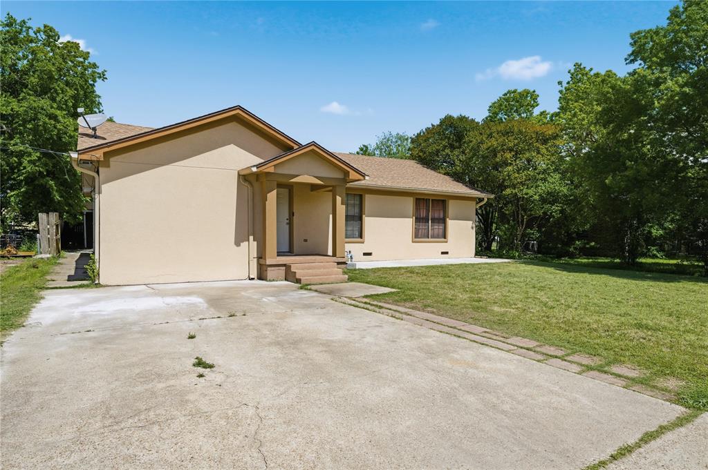 3624 Redbird Street Bellmead, TX 76705 - Photo 2 of 20 a front view of a house with a yard