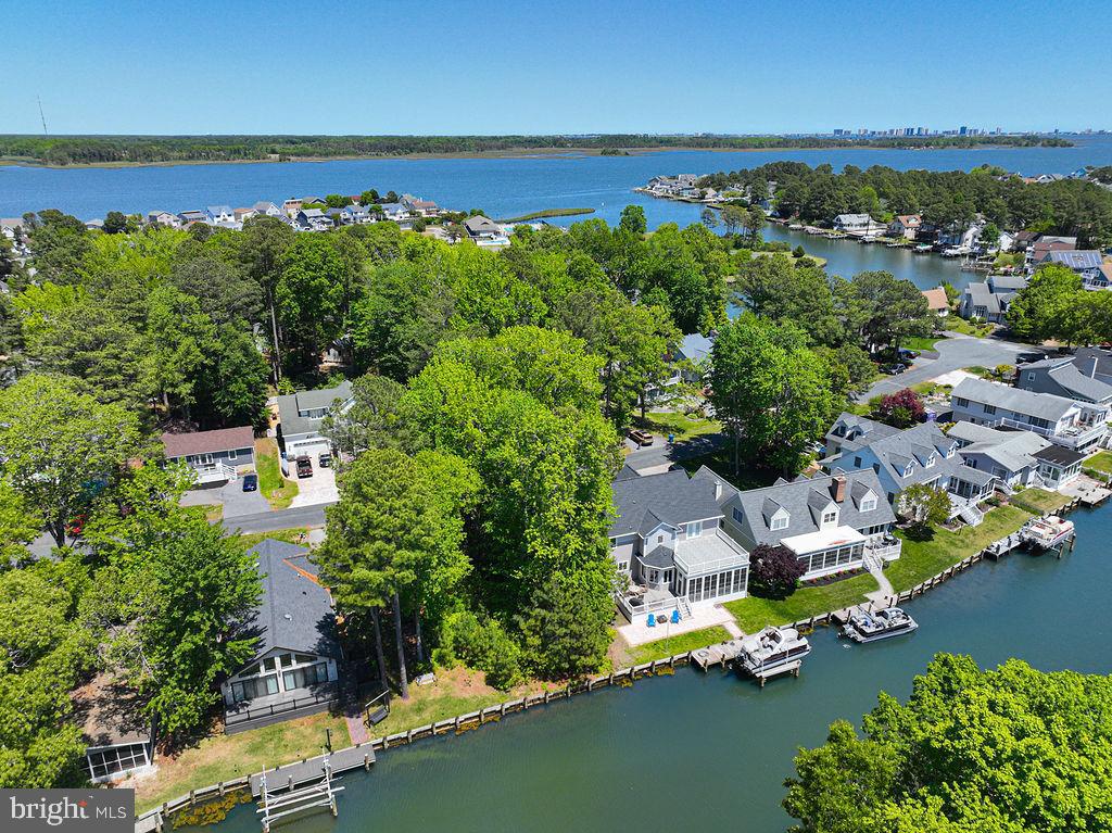 48 Grand Port Road Ocean Pines, MD 21811 - Photo 5 of 29 an aerial view of a house with a swimming pool yard and outdoor seating