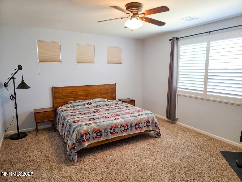 2775 Bonfire Lane Reno, NV 89521 - Photo 22 of 41 a bedroom with a bed and window