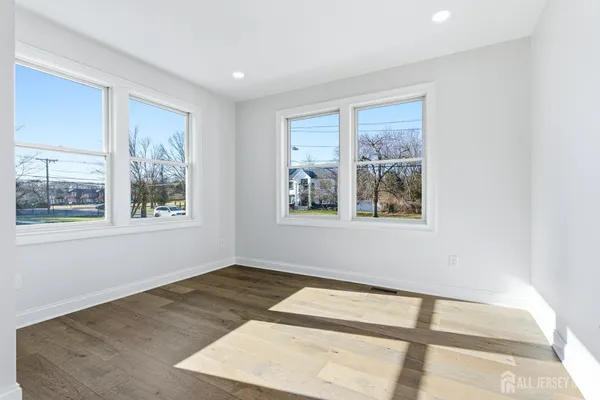 a view of an empty room with a large window